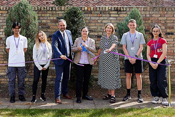 Students at the Maths School celebrate its opening with the headteacher, deputy CEO of the Eastern Learning Alliance and University Professor Julia Gog.