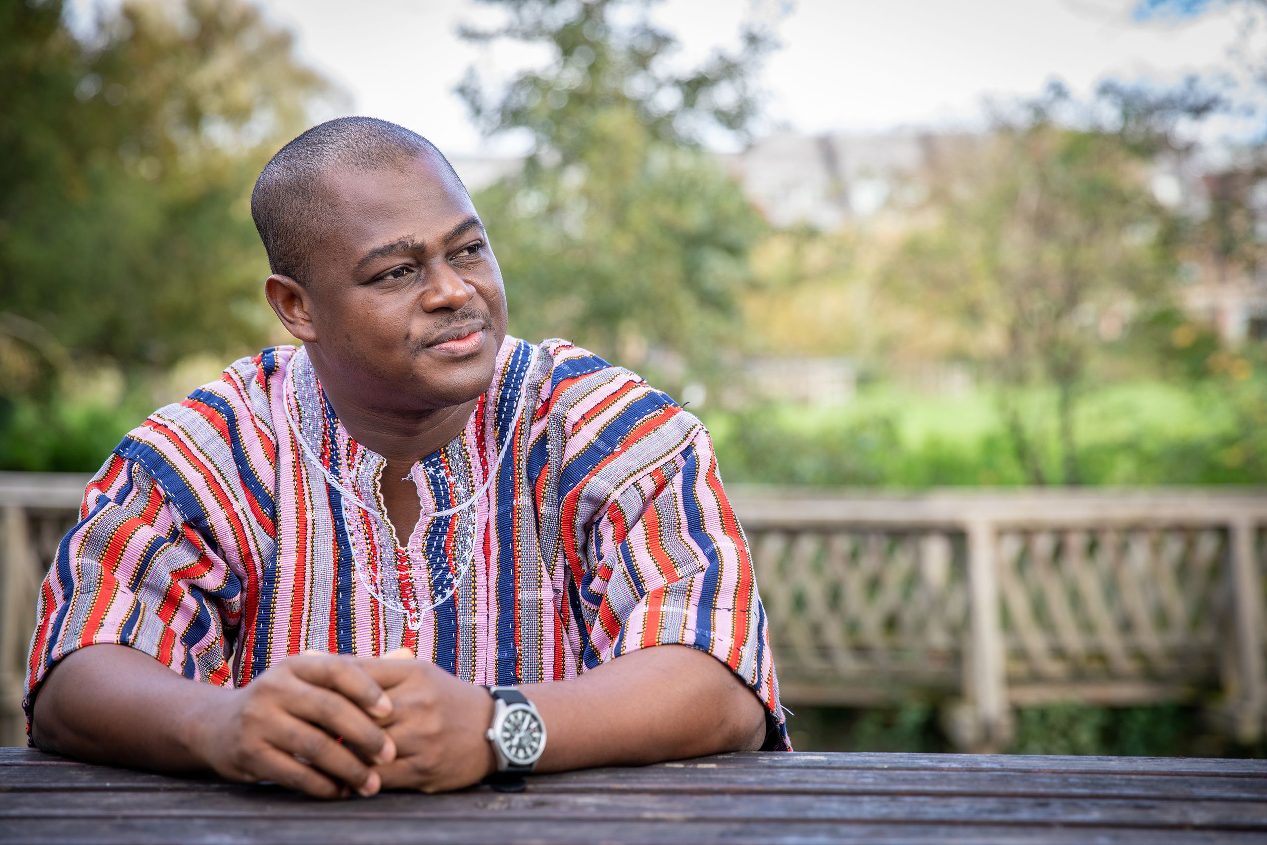 Kwabena Kusi-Mensah in the gardens at Darwin College 