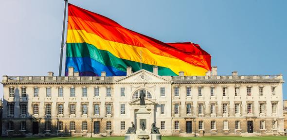 Composite of Gibbs Building at King's College superimposed onto a rainbow flag