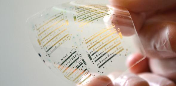 Circuits patterned on a plastic substrate