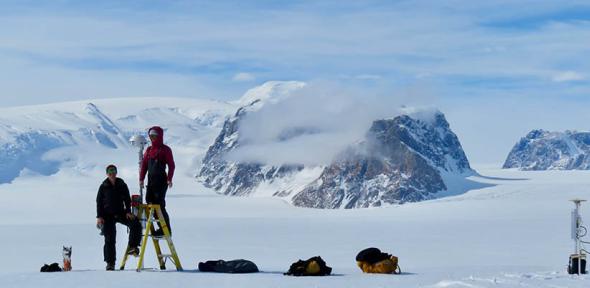 Ali Banwell and Laura Stevens installing the time-lapse camera used in this study on the George VI Ice Shelf in Antarctica. 