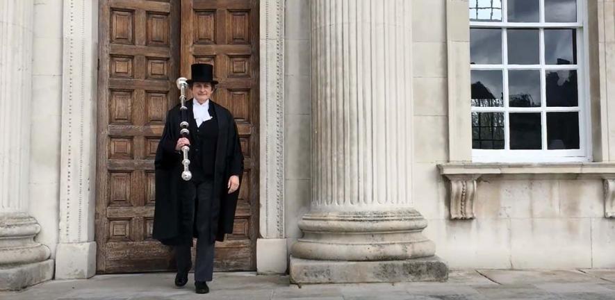 The University Marshal outside Senate House in 2018.