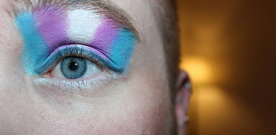 Woman with transgender flag make-up