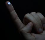 On-chip spectrometer on a fingertip