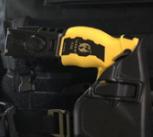 A City of London police officer armed with a Taser