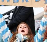 Cambridge fans cheering Varsity Rugby.