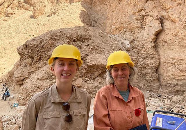 Bryony Smerdon (Former St Edmund’s College Masters student) and Dr Judith Bunbury at the site of the tomb. The entrance to the new tomb is visible just behind Bunbury's left shoulder.