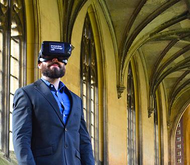 Chris MacDonald wearing VR headset at College.