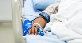 Male patient in a hospital bed