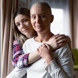 Mother and daughter. The mother is a cancer survivor.