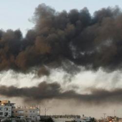 Smoke rises after an Israel air strike in Gaza Strip December 28, 2008.