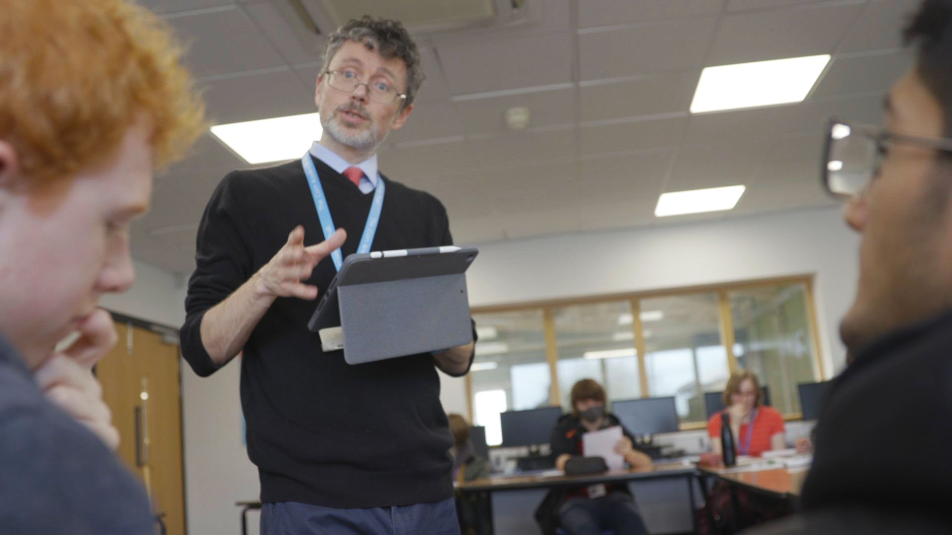 Mark Dawes teaching maths to sixth formers at Comberton Village College