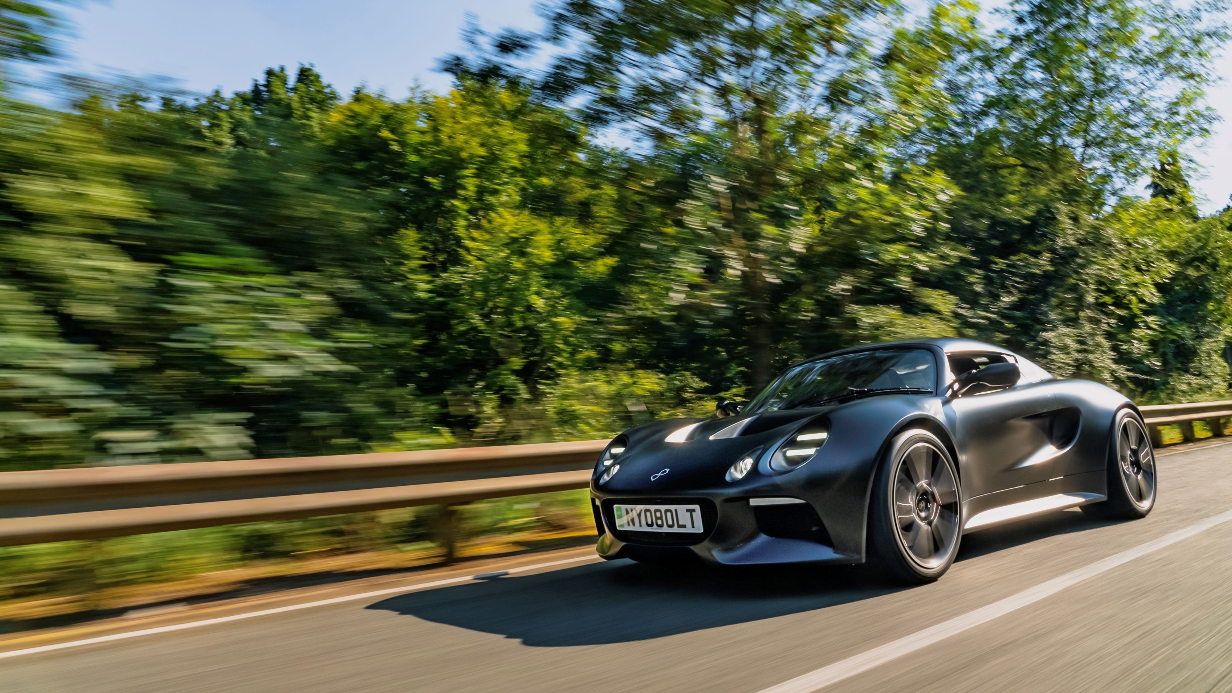 The Nyobolt electric supercar in motion driving on a road