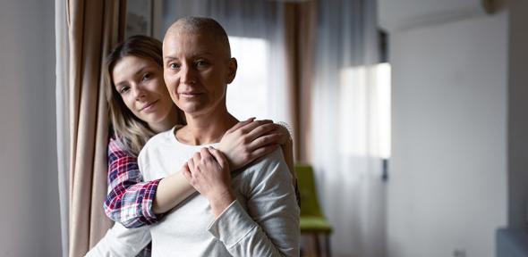 Mother and daughter. The mother is a cancer survivor.