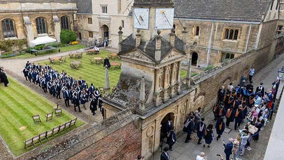 Graduands in Gonville and Caius College and Senate House Passage.