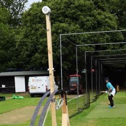 Cambridge University Cricket Club player Alice faces the Venn bowling machine.