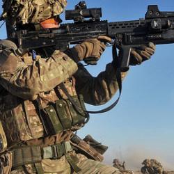 British Army Soldier in Afghanistan Engaging the Enemy